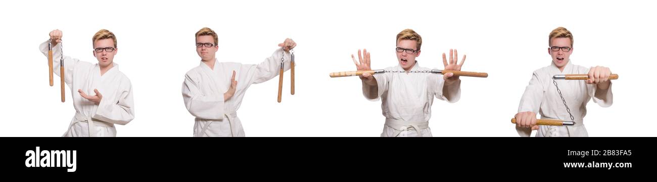 Le funny karate fighter avec nunchucks on white Banque D'Images