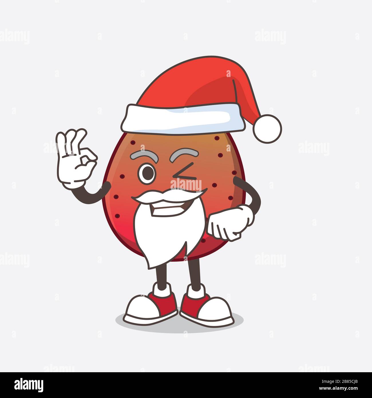 Une photo du personnage de la mascotte de santa de la figure dessinée indienne avec un doigt ok Banque D'Images