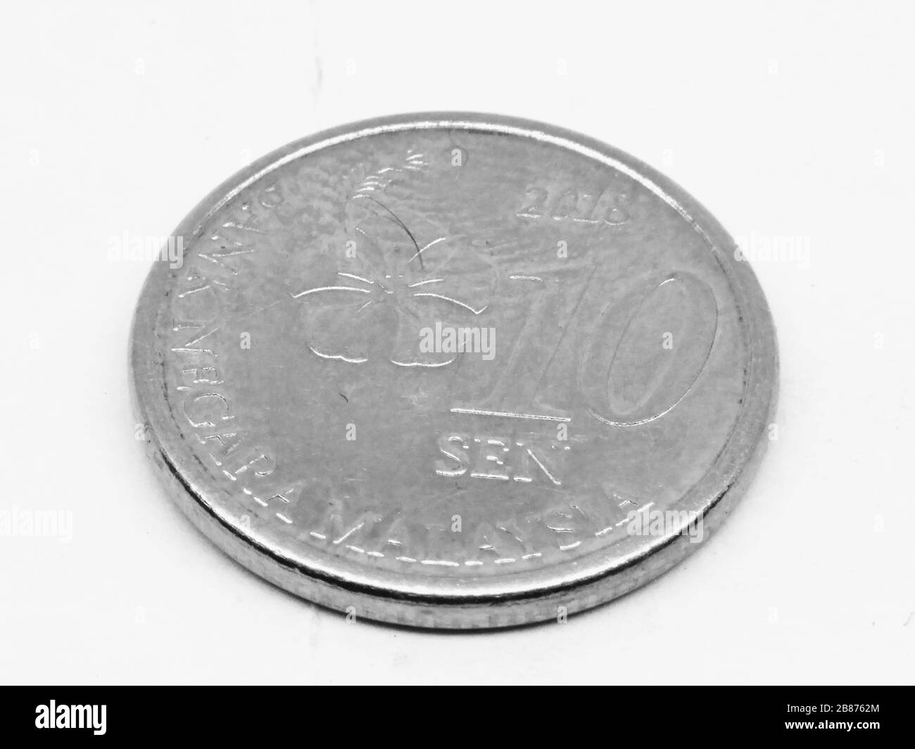 Une photo de pièce de monnaie avec fond blanc Banque D'Images