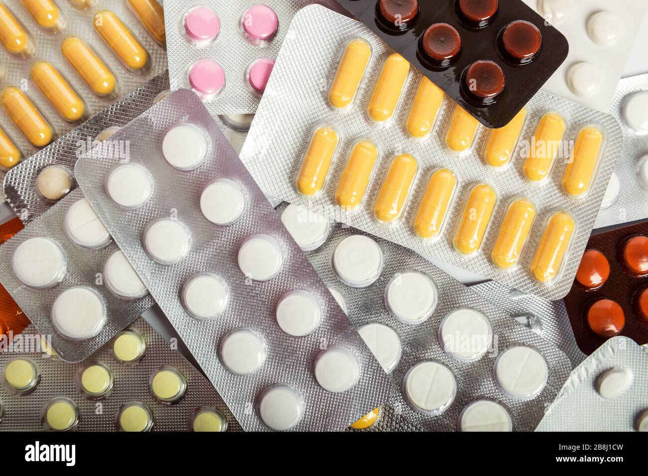 Pilules et capsules en plaquettes thermoformées, milieu pharmaceutique médical Banque D'Images