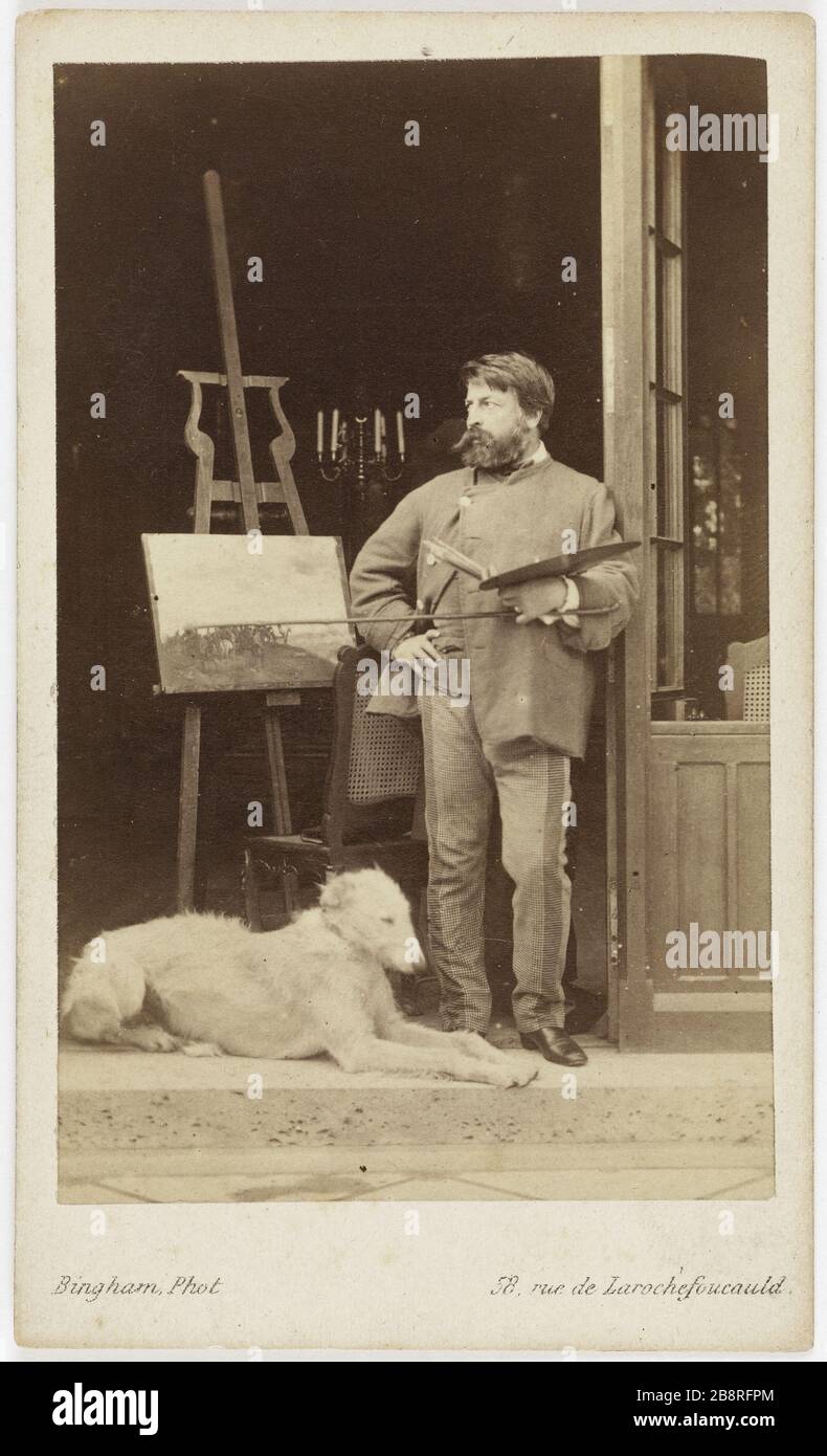 Portrait d'Ernest Meissonnier (1815-1891), peintre, près de sa servante. Portrait d'Ernest Meissonnière (1815-1891), PEINtre, près de son chevalet. Carte de visite (recto). Photo de Robert Jefferson Bingham (1824-1870). Rage sur papier alluminé, entre 1860 et 1890. Paris, musée Carnavalet. Banque D'Images
