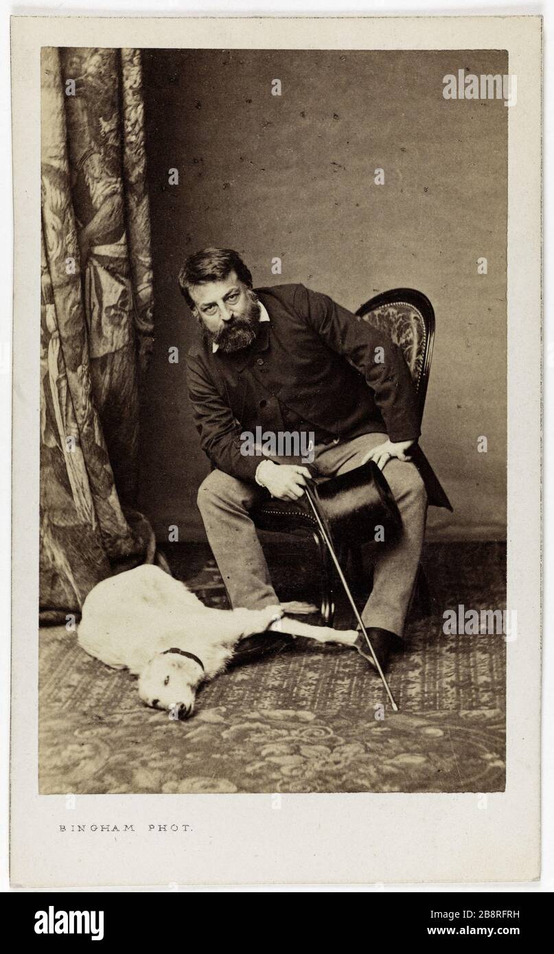 Portrait d'Ernest Meissonnière (1815-1891), peintre et son chien. Portrait d'Ernest Meissonnière (1815-1891), PEINtre et fils chien. Photo de Robert Jefferson Bingham (1824-1870). Carte de visite (recto). Rage sur papier alluminé. 1860-1890. Paris, musée Carnavalet. Banque D'Images