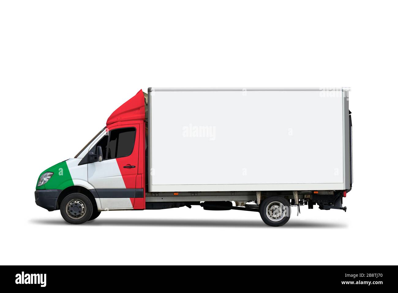 Camion de livraison italien en mouvement sur route forestière. C'est un chemin pour la cabine et le bilboard Banque D'Images