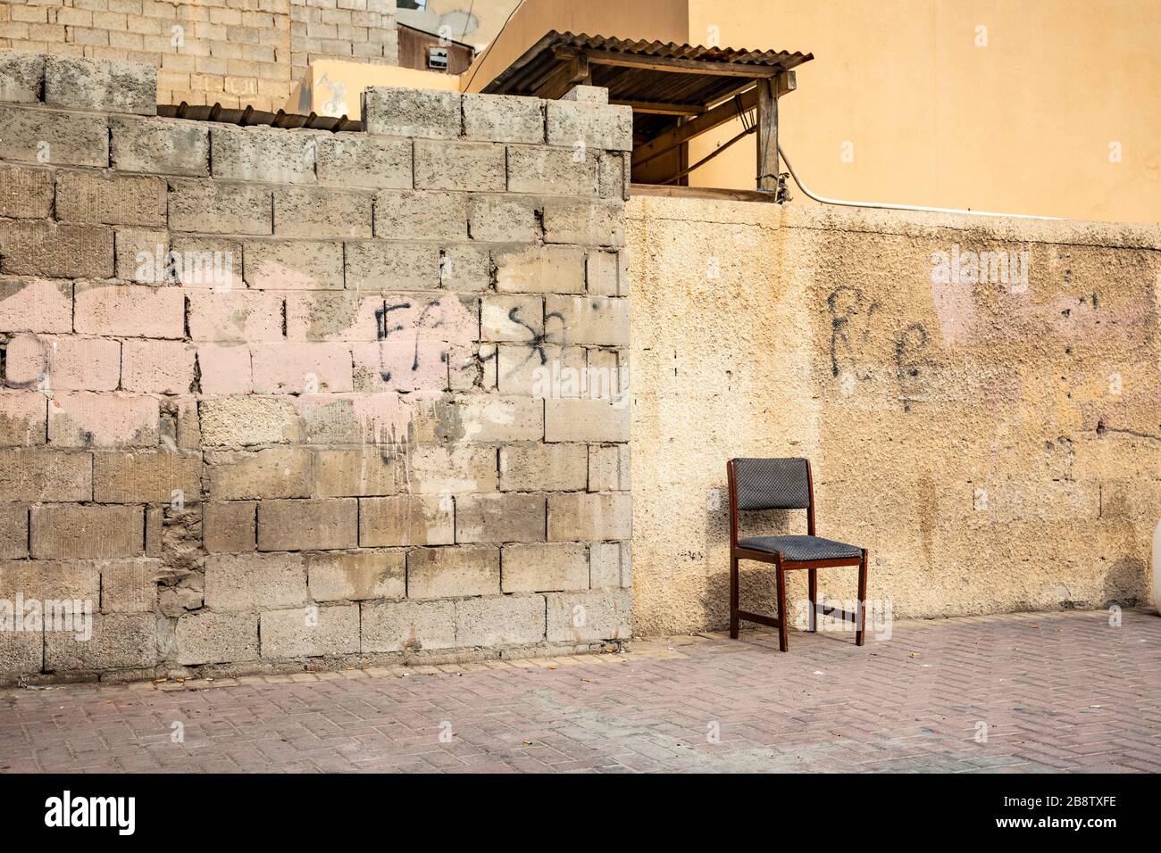 Président contre un mur au Bahreïn Banque D'Images