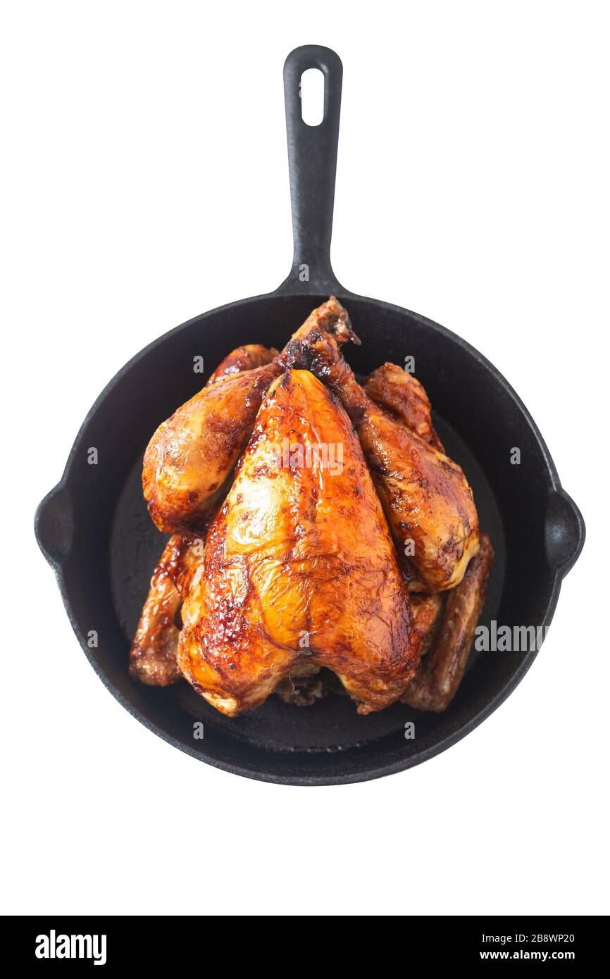 Concept de nourriture poulet grillé, grillé entier biologique dans une poêle  à frire isolée sur fond avec un chemin de découpe Photo Stock - Alamy