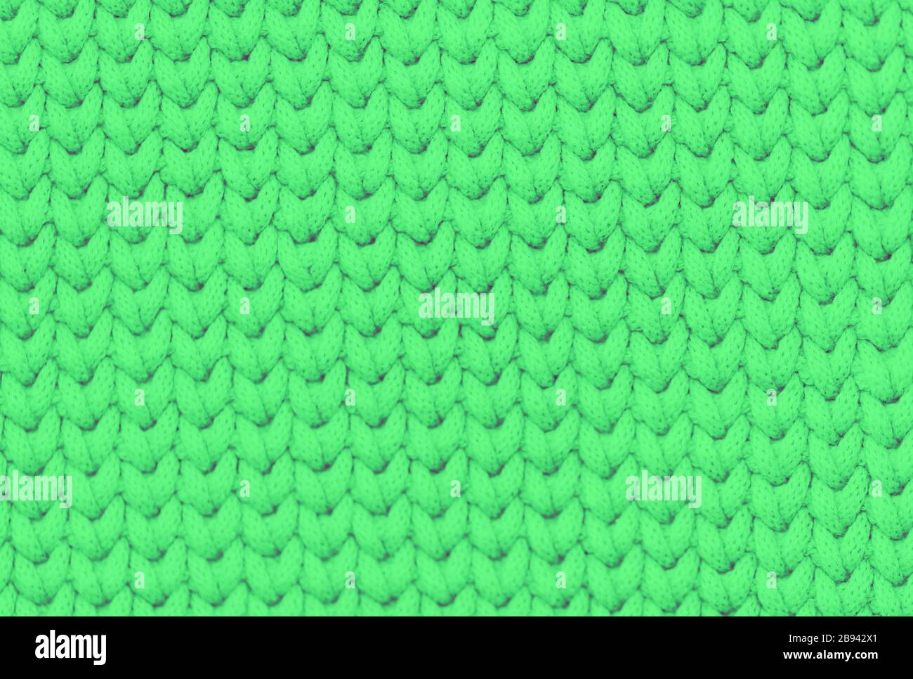 Tissu tricoté vert vif texture douce arrière-plan Banque D'Images