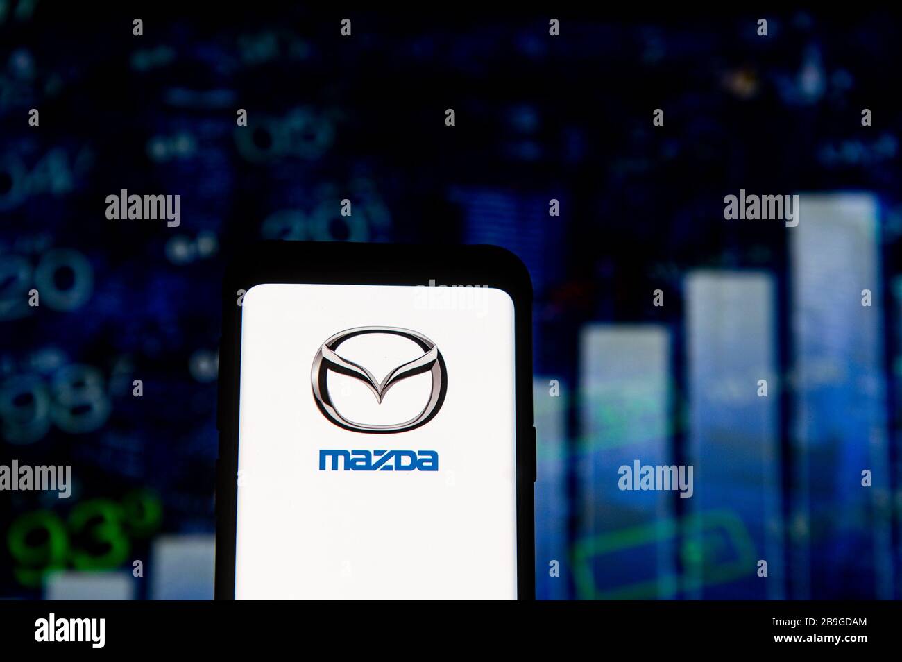 Pologne. 23 mars 2020. Dans cette illustration photo, un logo Mazda apparaît sur un smartphone. Crédit: Mateusz Slodkowski/SOPA Images/ZUMA Wire/Alay Live News Banque D'Images