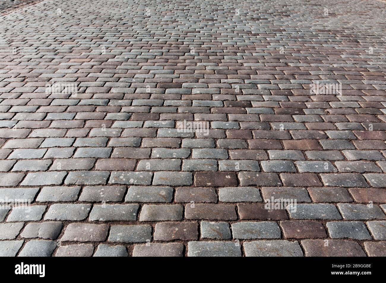 Texture de la chaussée en pierre, texture de la route pavée Banque D'Images