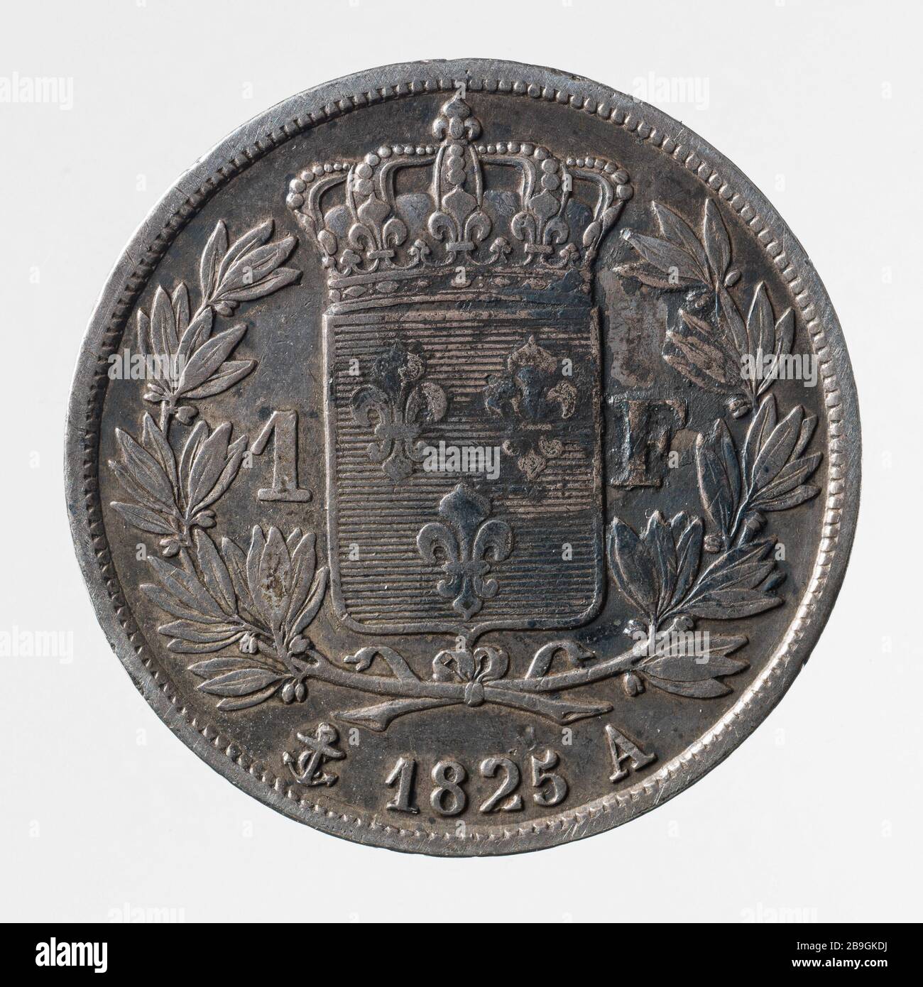 Pièce 1 Franc Charles X en 1825 Auguste François Michaut. Pièce de 1 franc de Charles X, 1825. Argent. 1825. Paris, musée Carnavalet. Banque D'Images