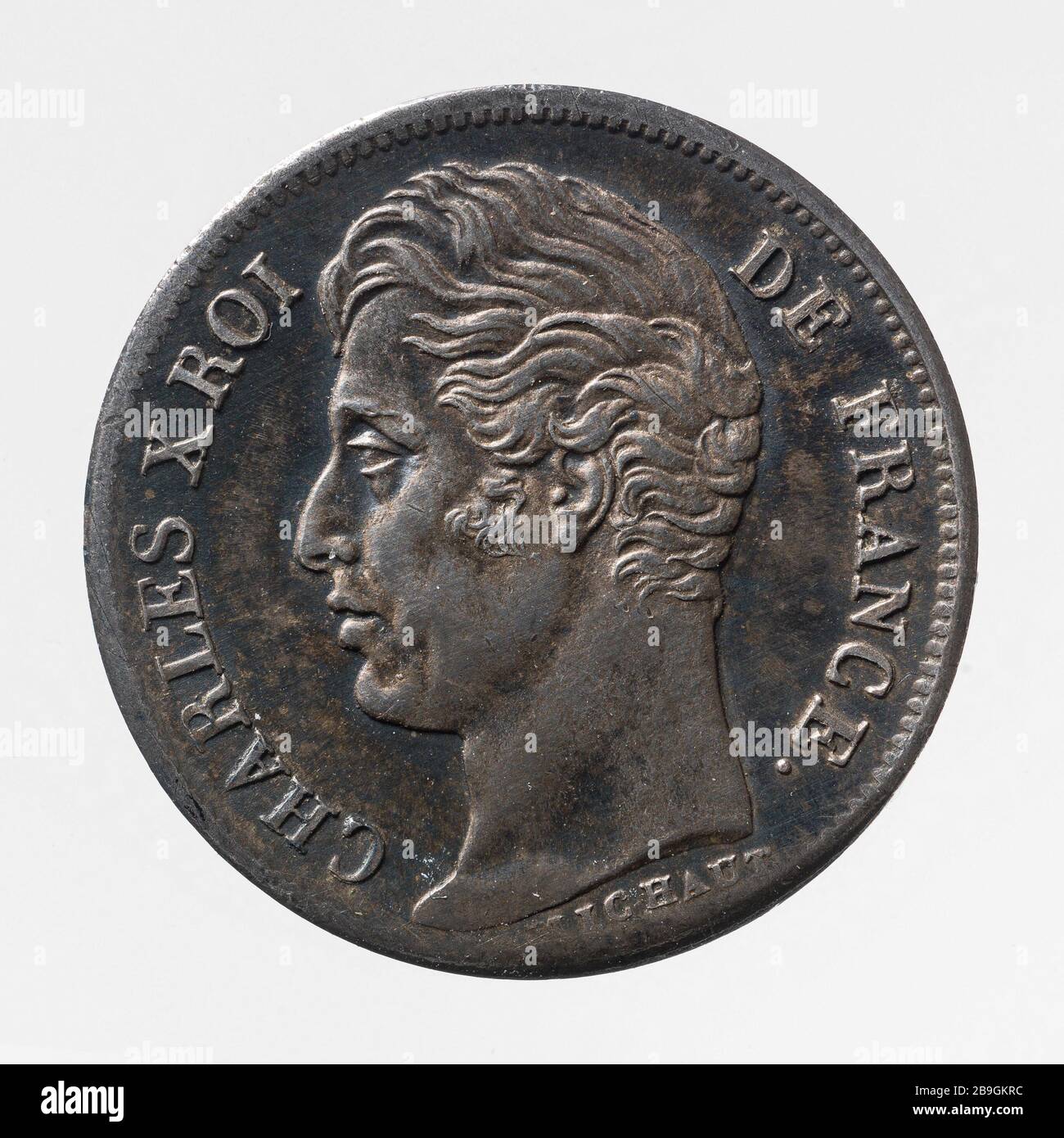 Pièce 1/2 Franc Charles X en 1830 Auguste François Michaut. Pièce de 1/2 franc de Charles X, 1830. Argent. 1830. Paris, musée Carnavalet. Banque D'Images