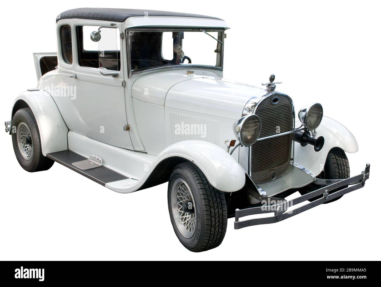 Blanc antique Vintage Automobile contre fond blanc Banque D'Images