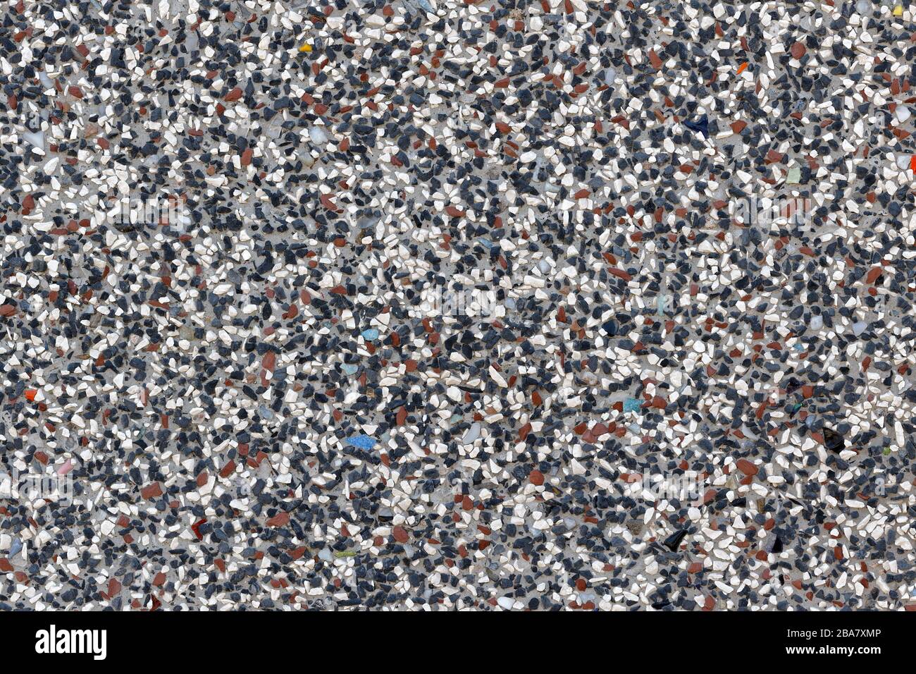 Fond de plâtre en pierre de couleur : détail de plâtre en pierre à variante blanc-bleu-rouge Banque D'Images