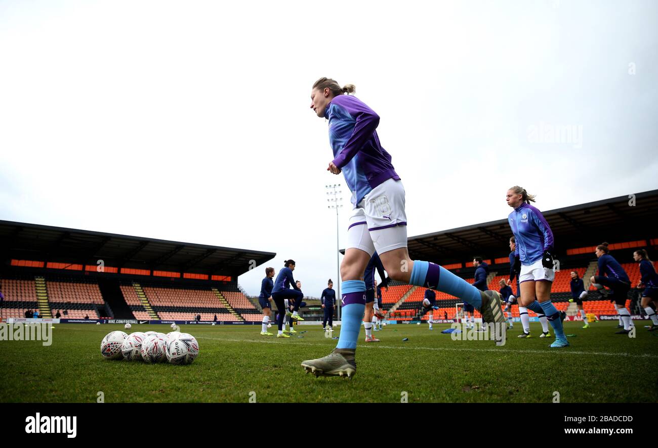 Manchester City Ellen White (centre) se réchauffe Banque D'Images