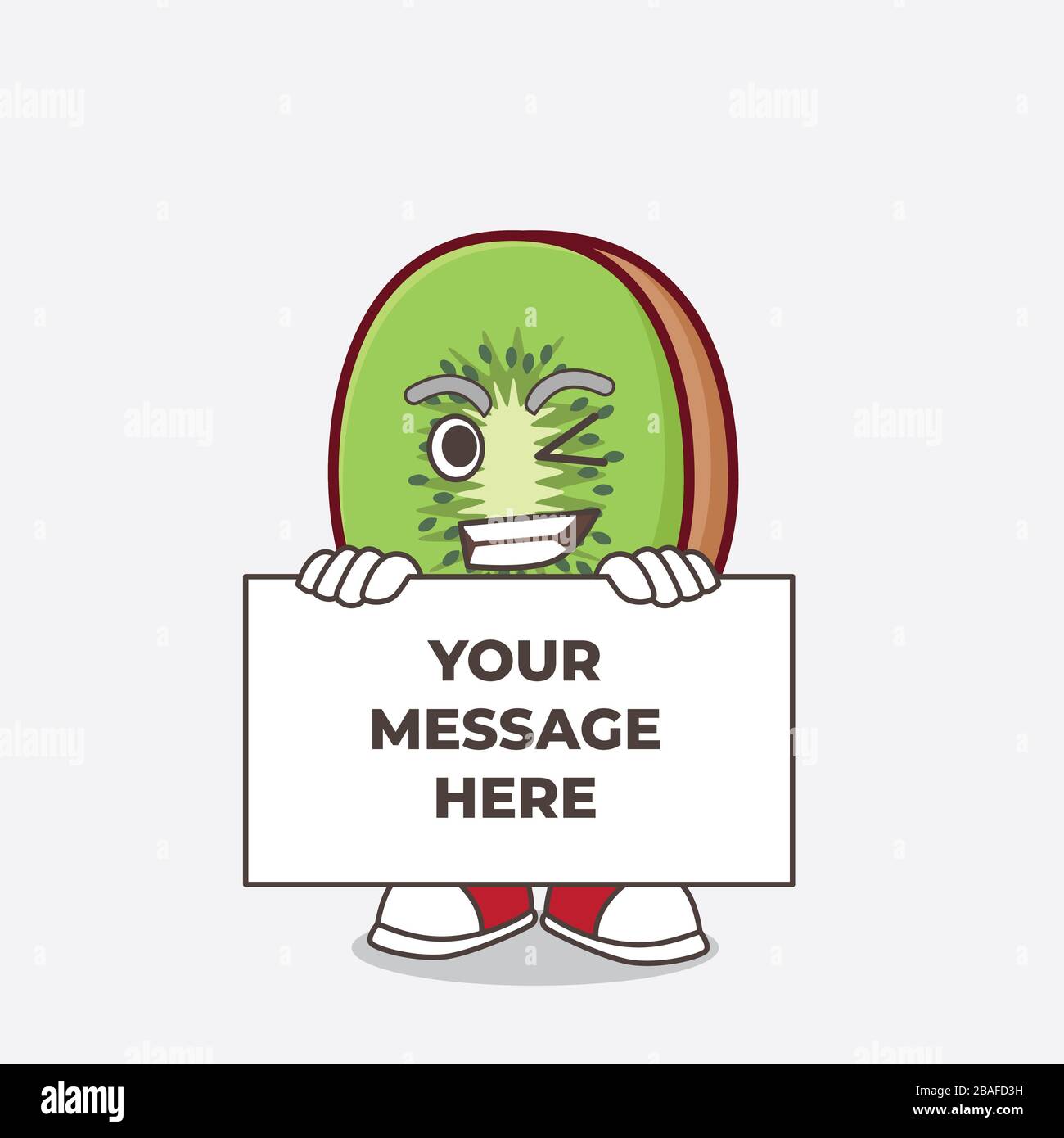 Une photo du personnage de mascotte de dessin animé de fruit de Kiwi avec le visage drôle se cache derrière un tableau Banque D'Images