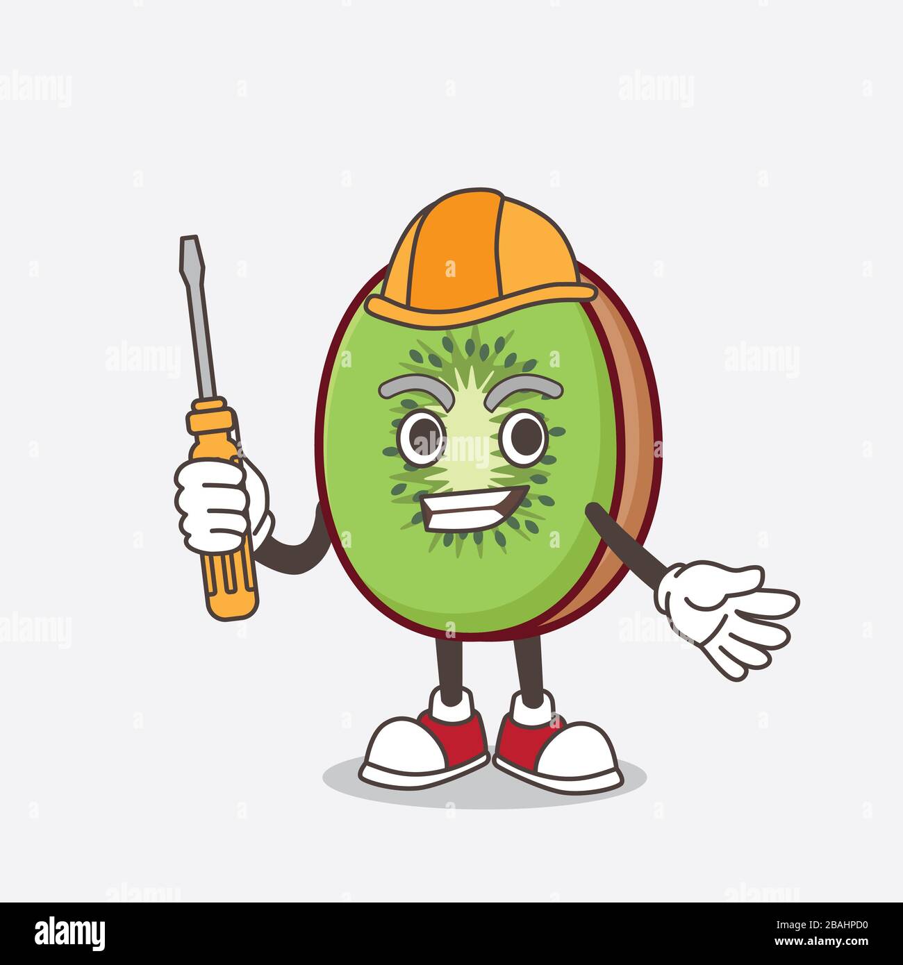 Une photo du personnage de la mascotte aux fruits de Kiwi en tant que technicien intelligent Banque D'Images