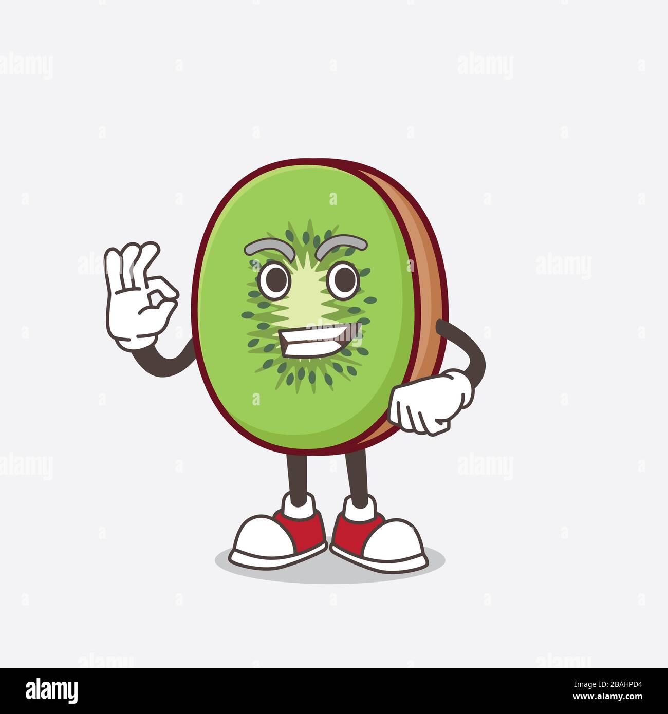 Une photo du personnage de la mascotte aux fruits de Kiwi avec un geste d'appel Banque D'Images