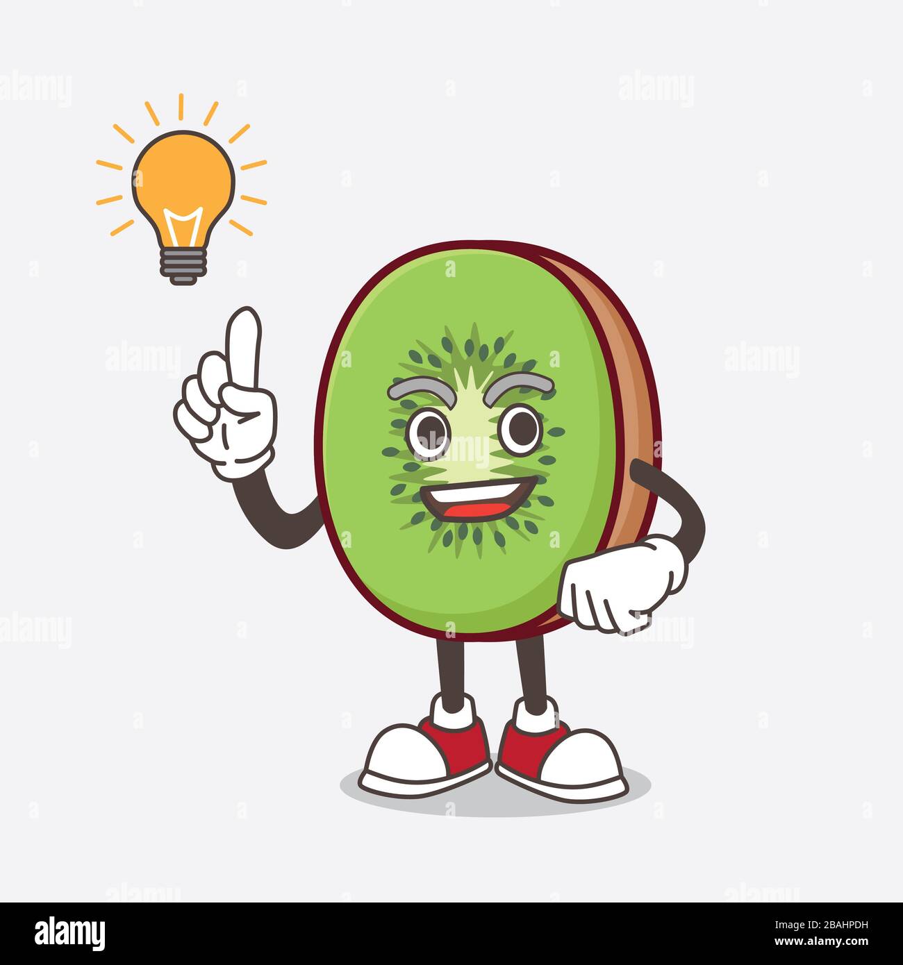 Une photo du personnage de mascotte aux fruits de Kiwi en a une idée Banque D'Images