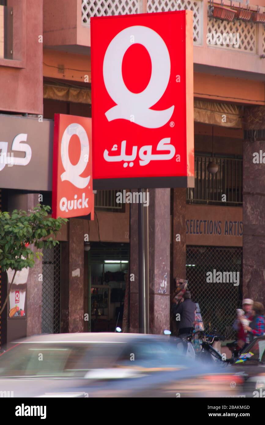 Le logo de fastfood chain QUICK (en langue arabe). Quick restaurants est à  l'origine une chaîne belge de restaurants rapides de hamburgers Photo Stock  - Alamy