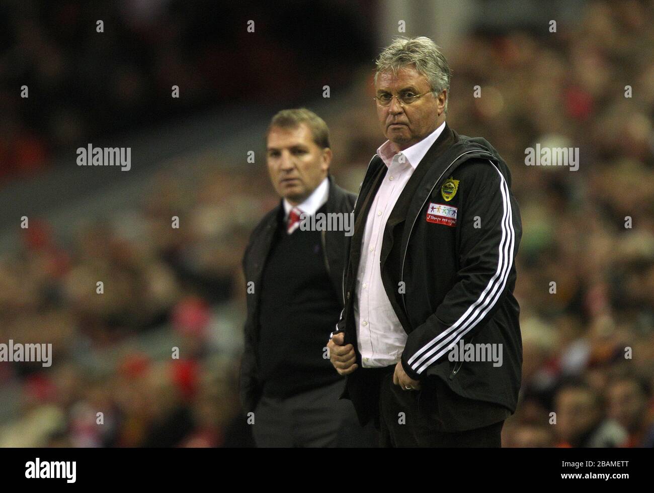 Anzhi Makhachkala Manager Guus Hiddink (à droite) et Liverpool Manager Brendan Rodgers sur le touchline Banque D'Images