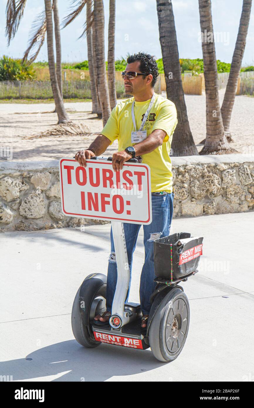 Miami Beach Florida,Lummus Park,Hispanic man men male adults,Segway,location,informations touristiques,FL110131043 Banque D'Images