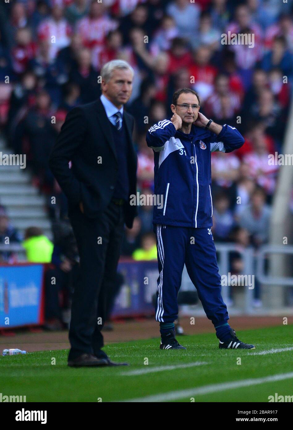 Martin O'Neill (à droite) et Alan Pardew (à gauche), directeur de Sunderland, sur l'écran tactile Banque D'Images