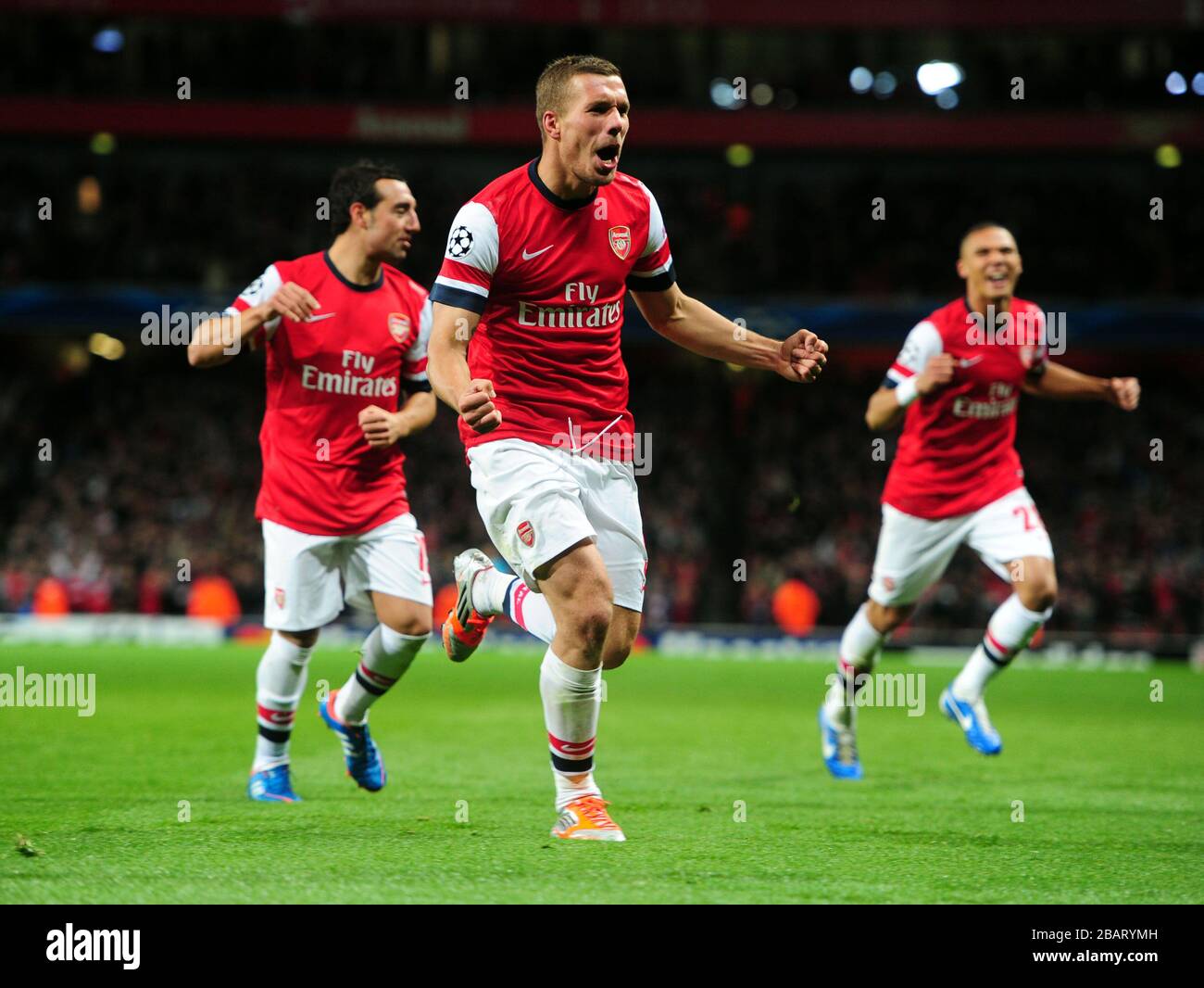 Lukas Podolski, d'Arsenal, célèbre son deuxième but Banque D'Images