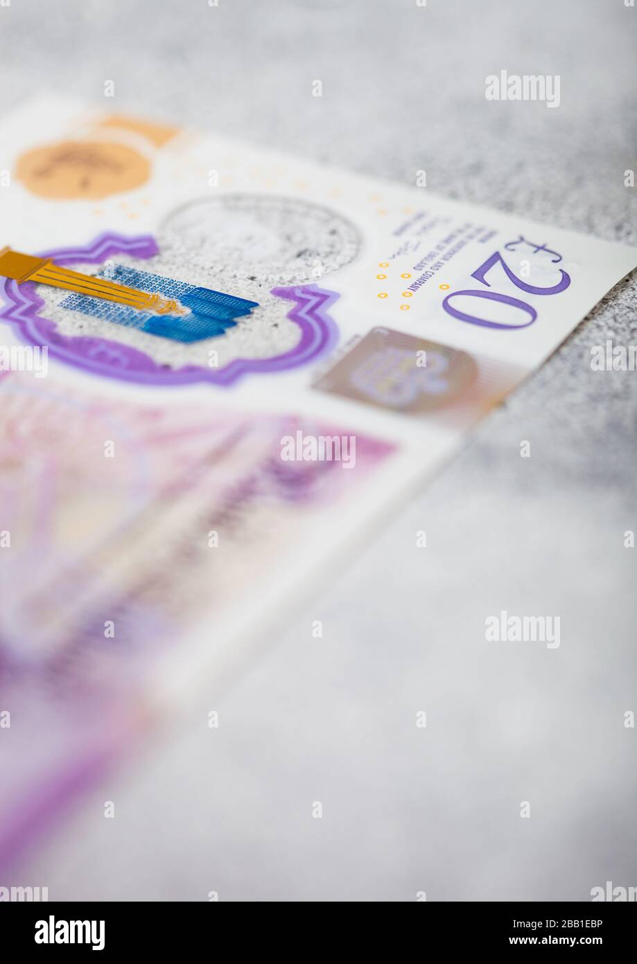 Billet de 20 livres gros plan sur fond clair. Macro Banque D'Images