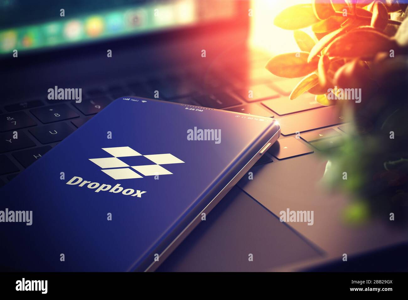 Dropbox sur l'écran du smartphone. Dropbox est un service d'hébergement de fichiers qui offre le stockage dans le Cloud, la synchronisation de fichiers, le Personal Cloud et le logiciel client. Illustration tridimensionnelle. KIEV, UKRAINE-JANVIER, 2020. Banque D'Images