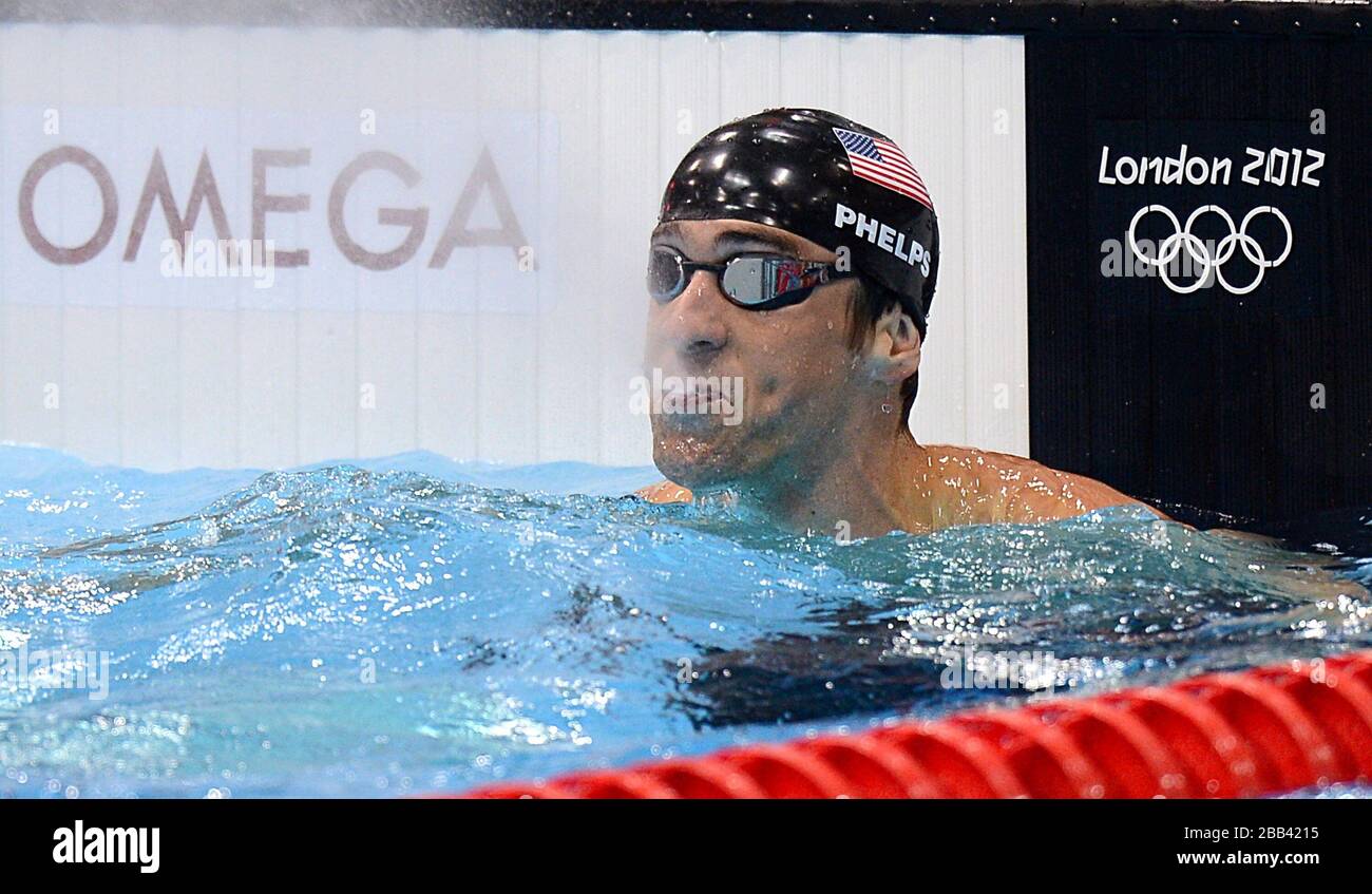 Michael Phelps des États-Unis après avoir remporté le 100 m Butterfly Semifinal 1 pour Homme au centre aquatique du parc olympique de Londres. Banque D'Images