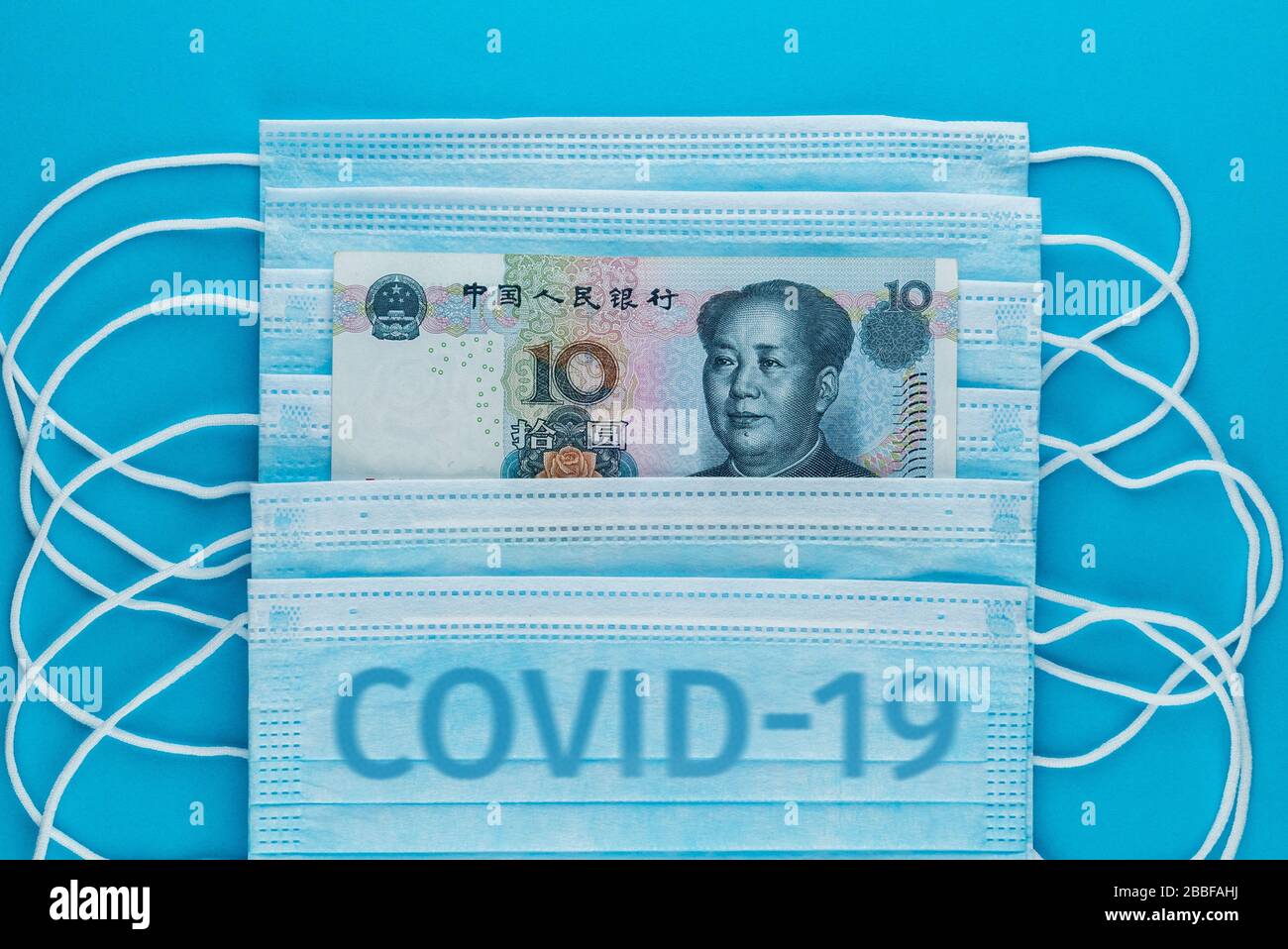 COVID-19 coronavirus en Chine. Monnaie chinoise 10 Banque D'Images