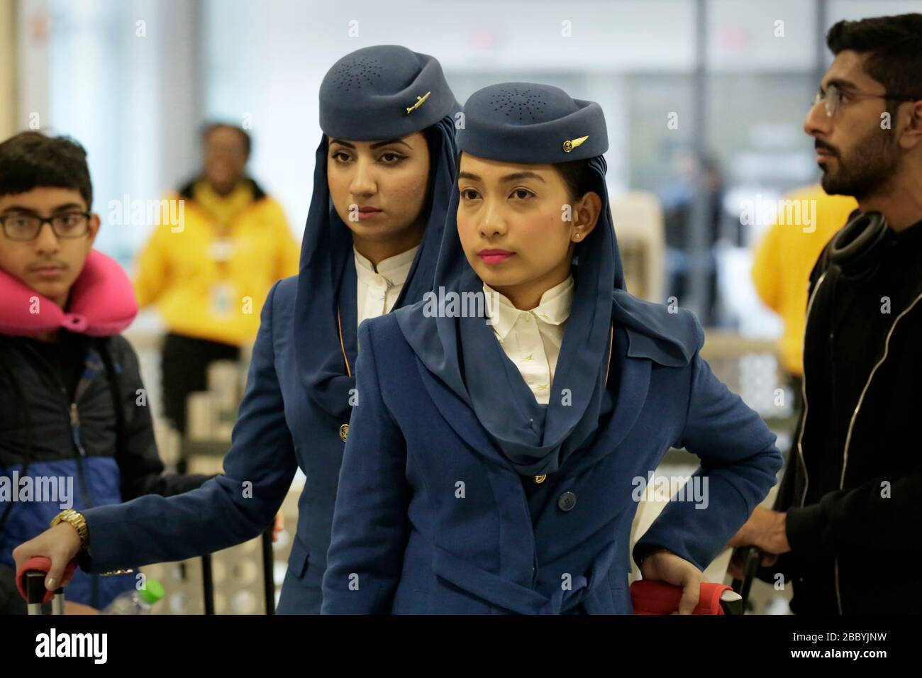 Les agents des douanes et de la protection des frontières des États-Unis ont fait un screening de passagers internationaux arrivant à l'aéroport international de Dulles à Dulles, Virginie, le 29 novembre 2016. Banque D'Images