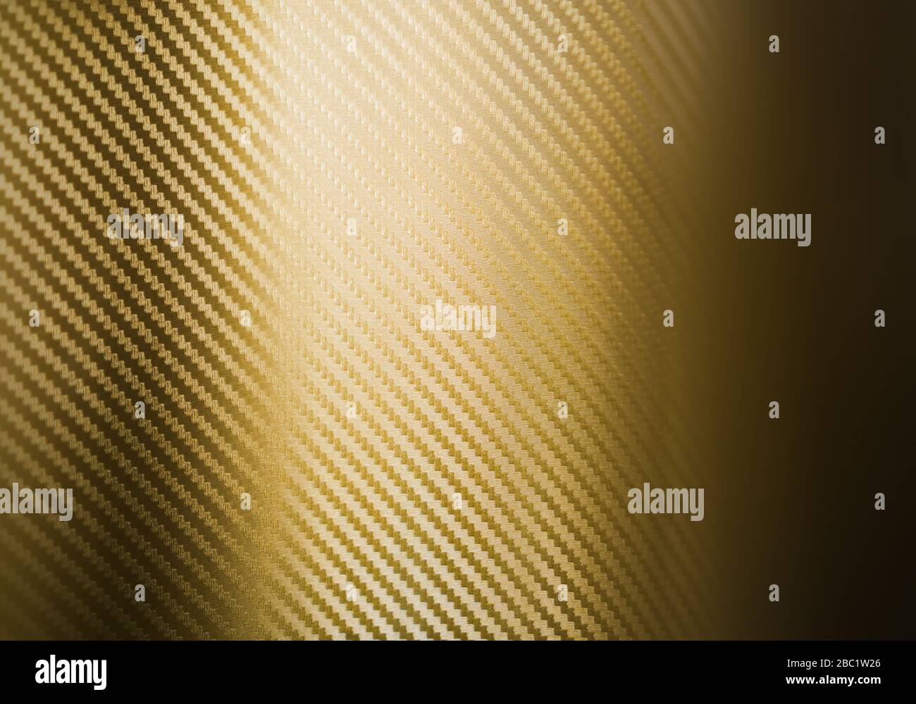 Texture de la fibre de carbone d'or Banque D'Images