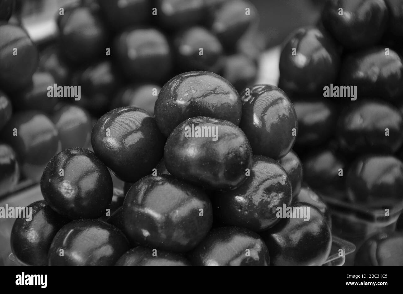 cerises fraîches en gros plan Banque D'Images