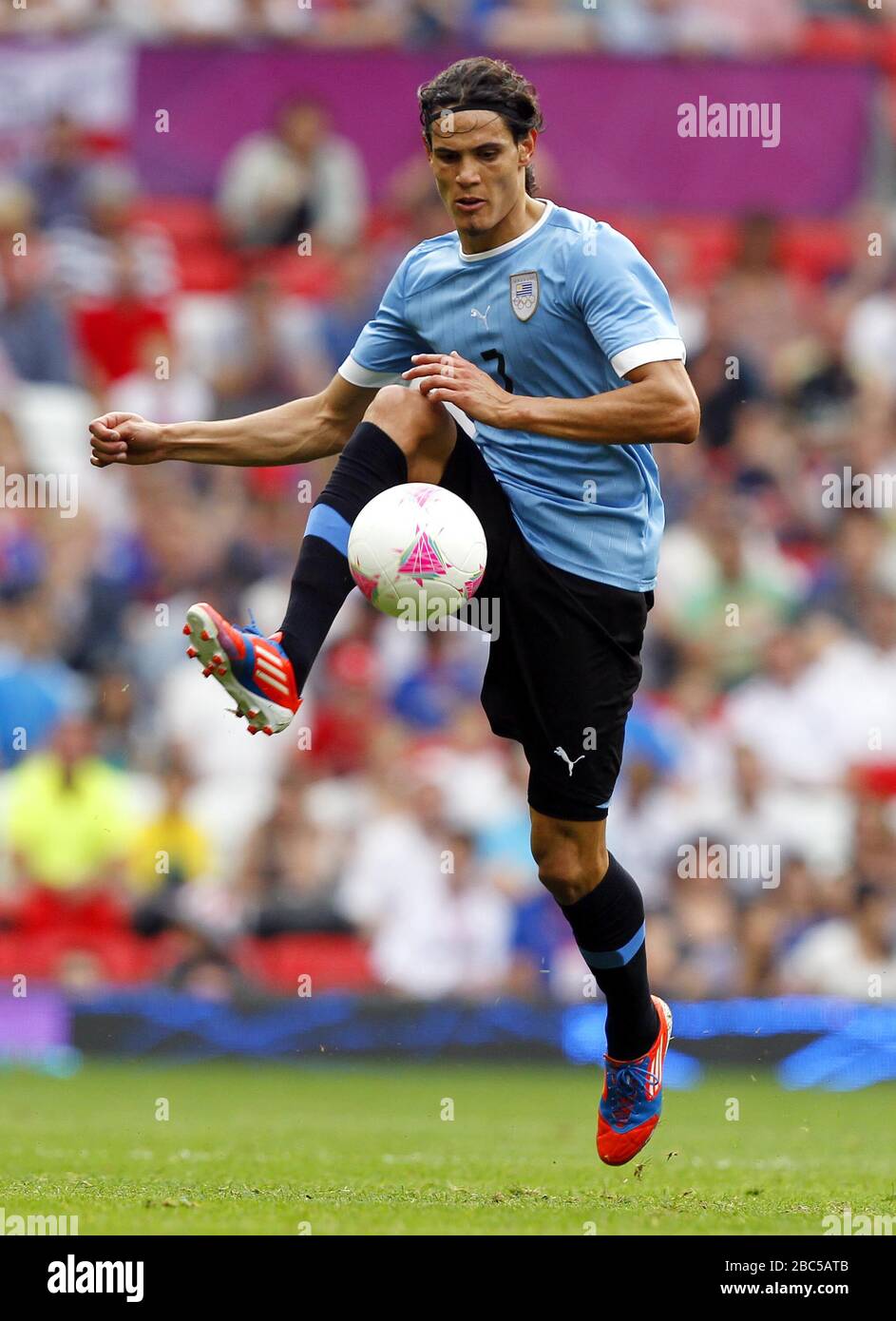 Le fils d'Uruguay, M. Edinani, aux Émirats arabes Unis et à l'Uruguay, Mens Football, First Round, a fait un match à Old Trafford, Manchester. Banque D'Images