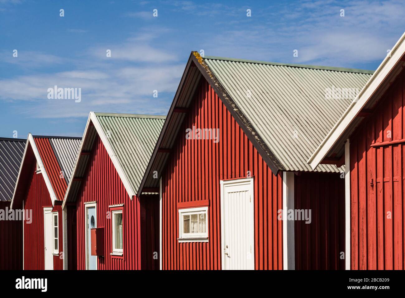 Suède, Bohuslan, Hamburgsund, criques de pêche rouges Banque D'Images