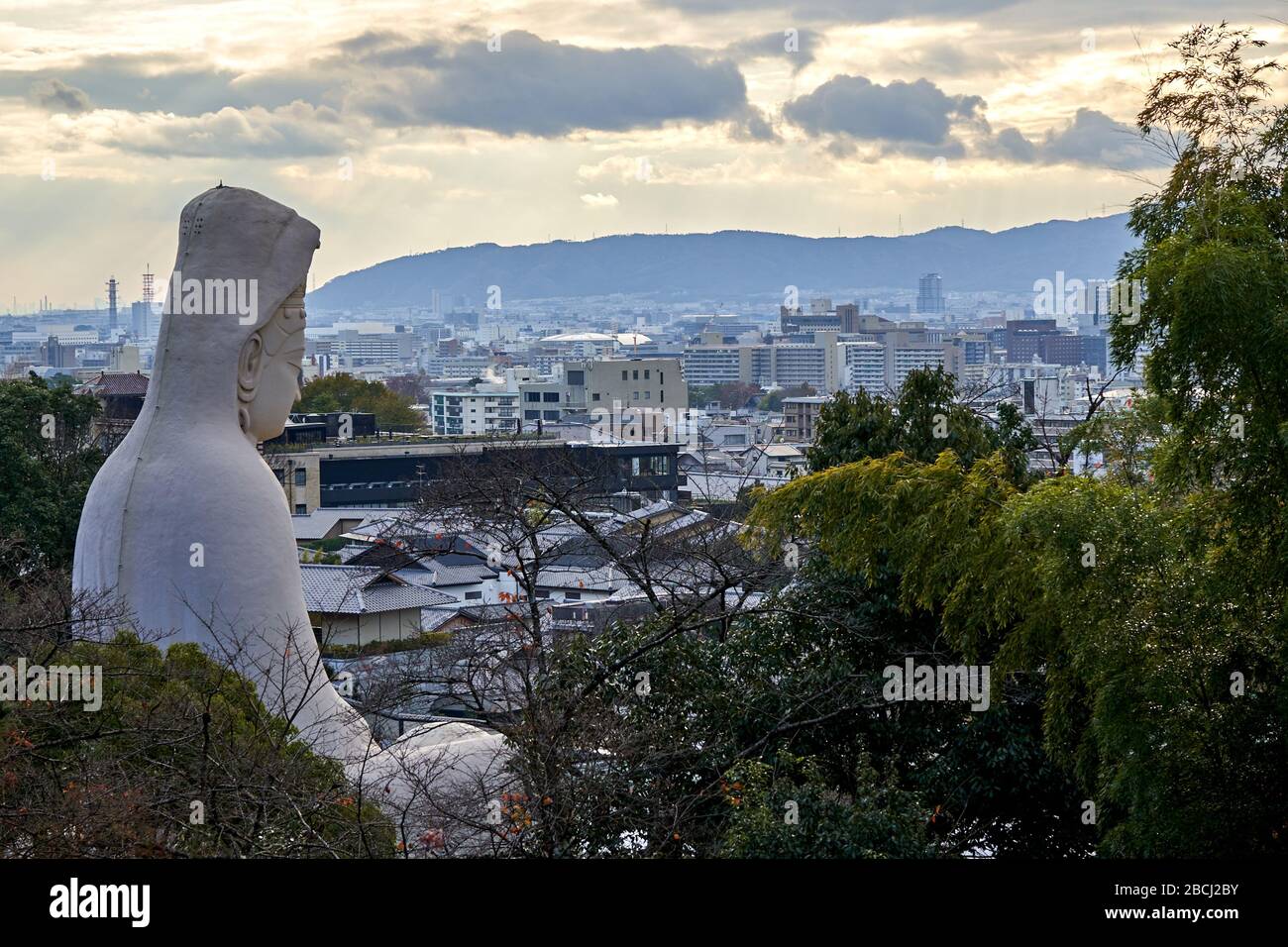 Sculpture en budha à Kyoto au coucher du soleil Banque D'Images