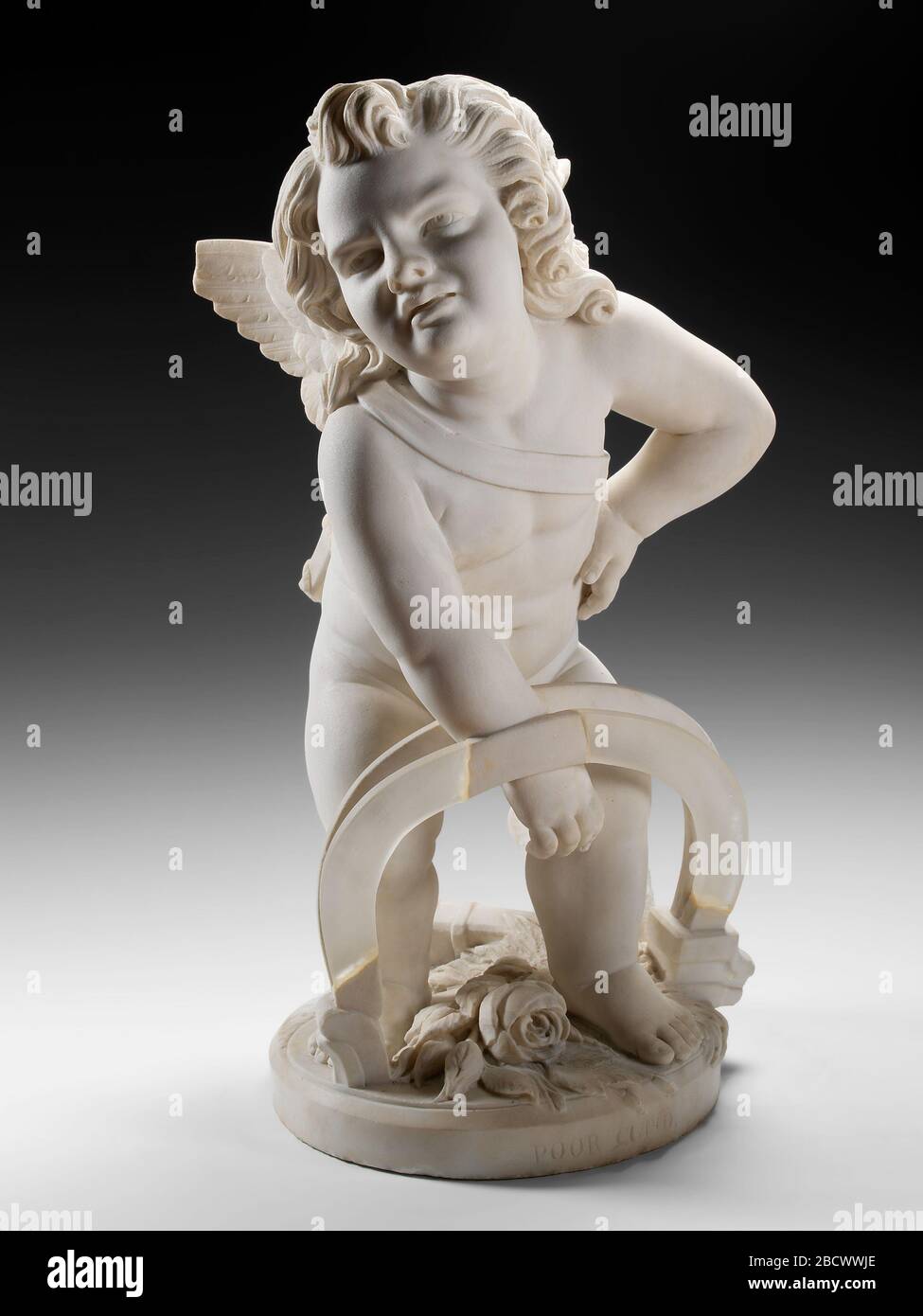 Pauvre Cupid. Edmonia Lewis a parfois sculpté des sculptures de scènes mythiques, qui étaient très populaires auprès des touristes américains visitant Rome. Pauvre Cupid, ou Amour ensnared, dépeint le chérubin avec sa main prise dans un piège quand il atteint pour une rose. Banque D'Images