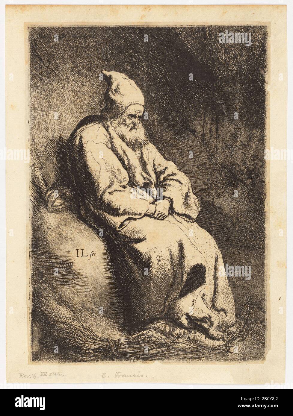 Le Hermit. Recherche dans Progressa robed figure assis dans un espace sombre, vu dans 3/4 vue, les mains dans le tour. Le Hermit Banque D'Images