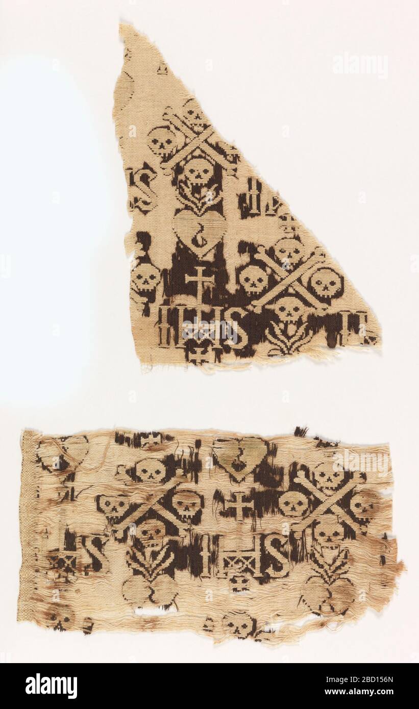 Fragments. Recherche sur les motifs ProgressReligious; monogramme Saint et crâne et os croisés. Fragments Banque D'Images