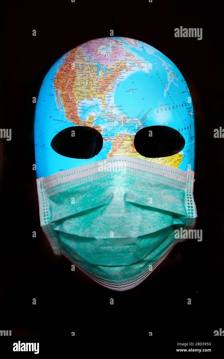 Masque texturé avec la carte de l'Amérique portant le masque chirurgical. Concept de la pandémie du virus corona. Banque D'Images
