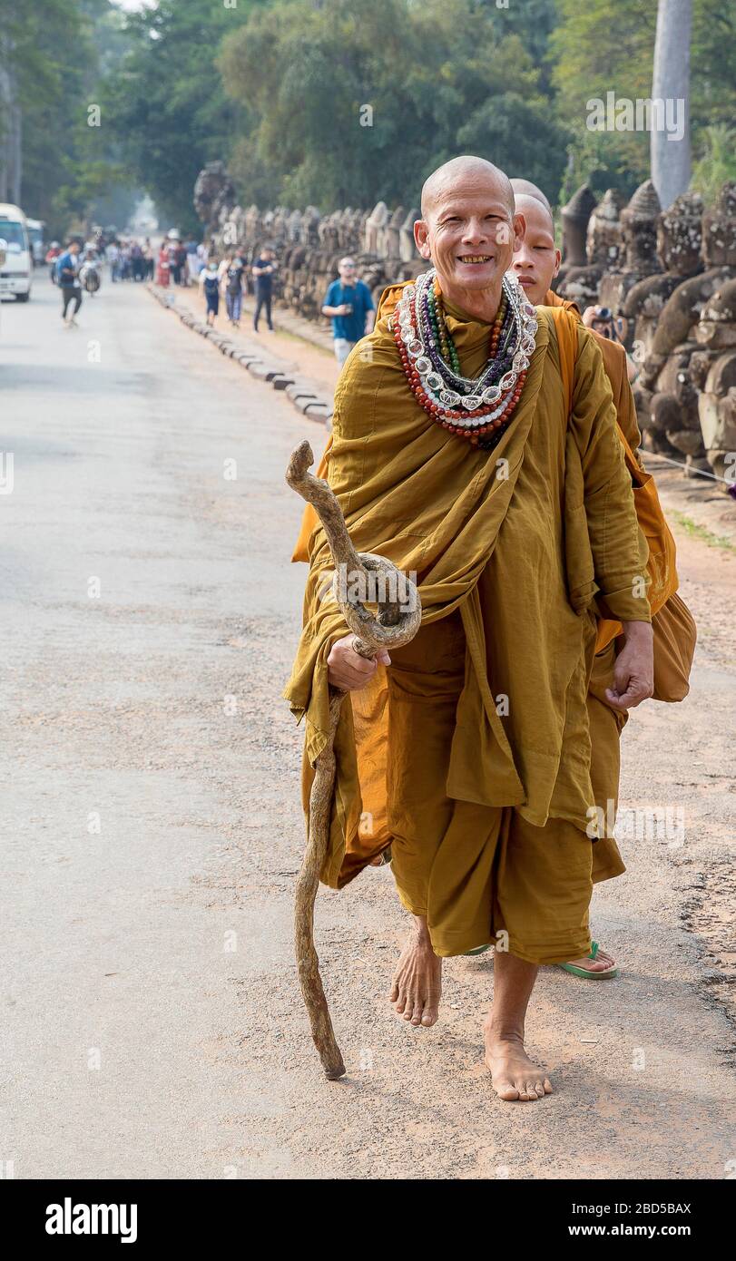Priest souriant, temple Bayon dans le complexe d'Angkor Wat, Siem Reap, Cambodge. Banque D'Images