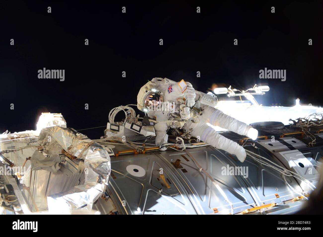 ISS - 15 janvier 2016 - l'astronaute britannique de l'ESA Tim Peake à l'extérieur de la Station spatiale internationale dans son espace lors d'une sortie spatiale - la première jamais o Banque D'Images