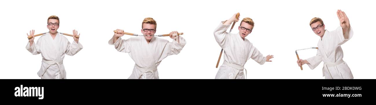 Le funny karate fighter avec nunchucks on white Banque D'Images