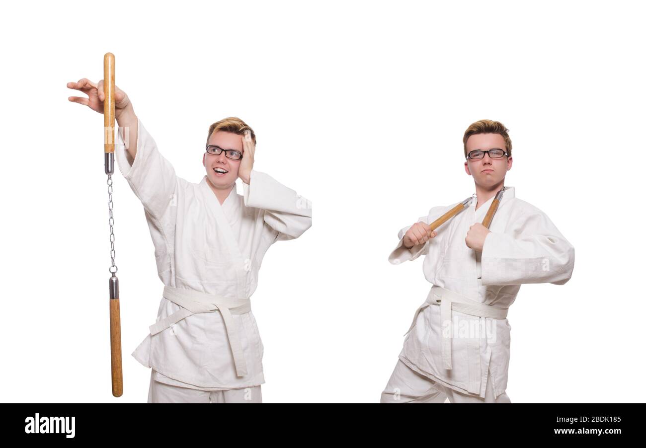 Le funny karate fighter avec nunchucks on white Banque D'Images