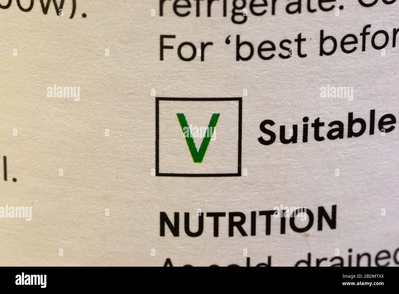 adapté au symbole végétarienne affiché sur l'étiquette d'emballage alimentaire avec une faible profondeur de champ Banque D'Images