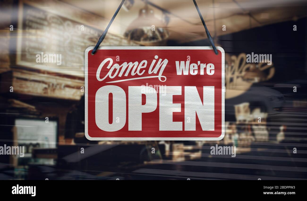 Un signe d'affaires qui dit « Come in we's Open » sur la fenêtre café / Restaurant. Banque D'Images Un signe d'affaires qui dit « Come in we's Open » sur la fenêtre café / Restaurant. Banque D'Images