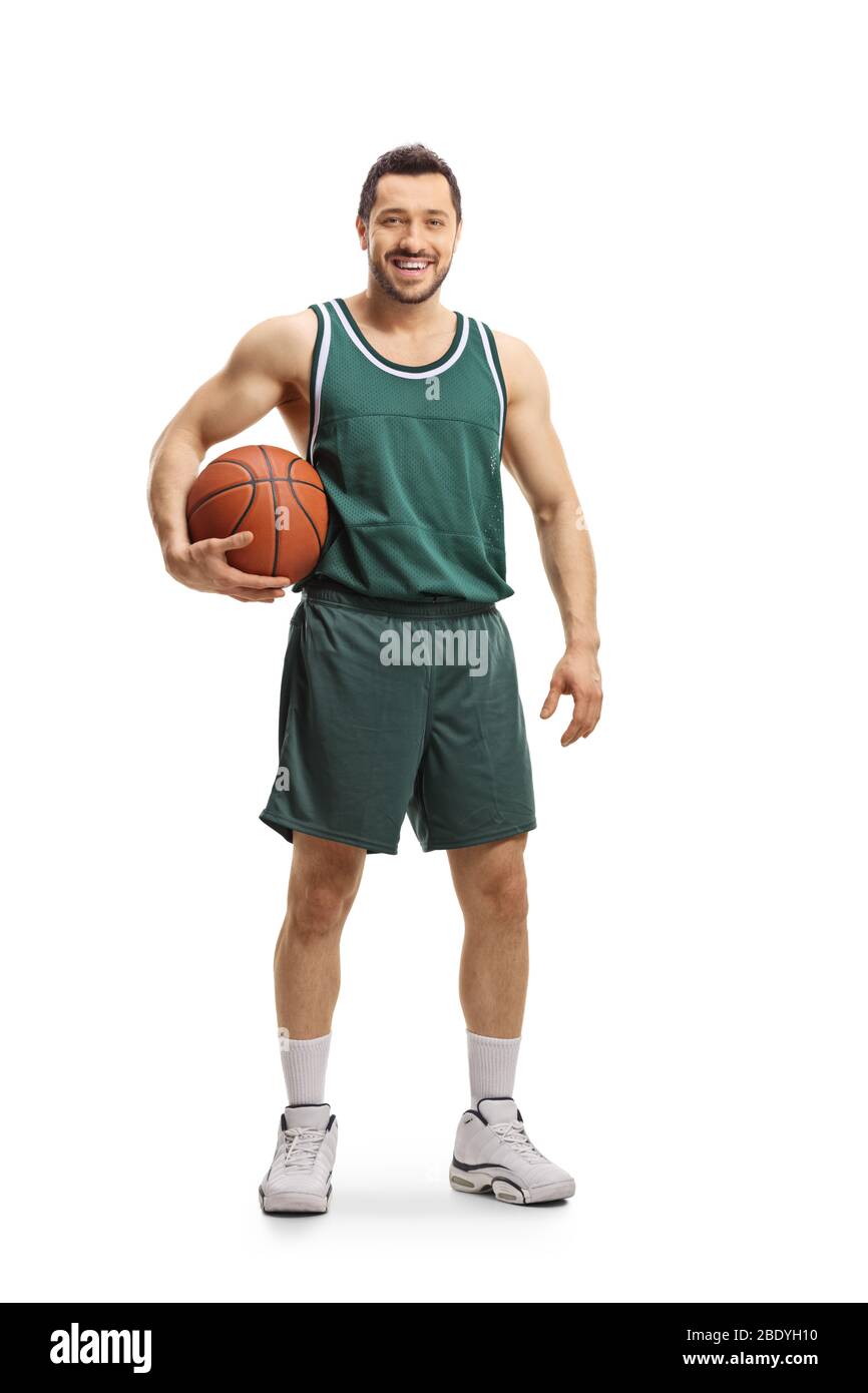 Portrait complet d'un joueur de basket-ball tenant une balle isolée sur fond blanc Banque D'Images