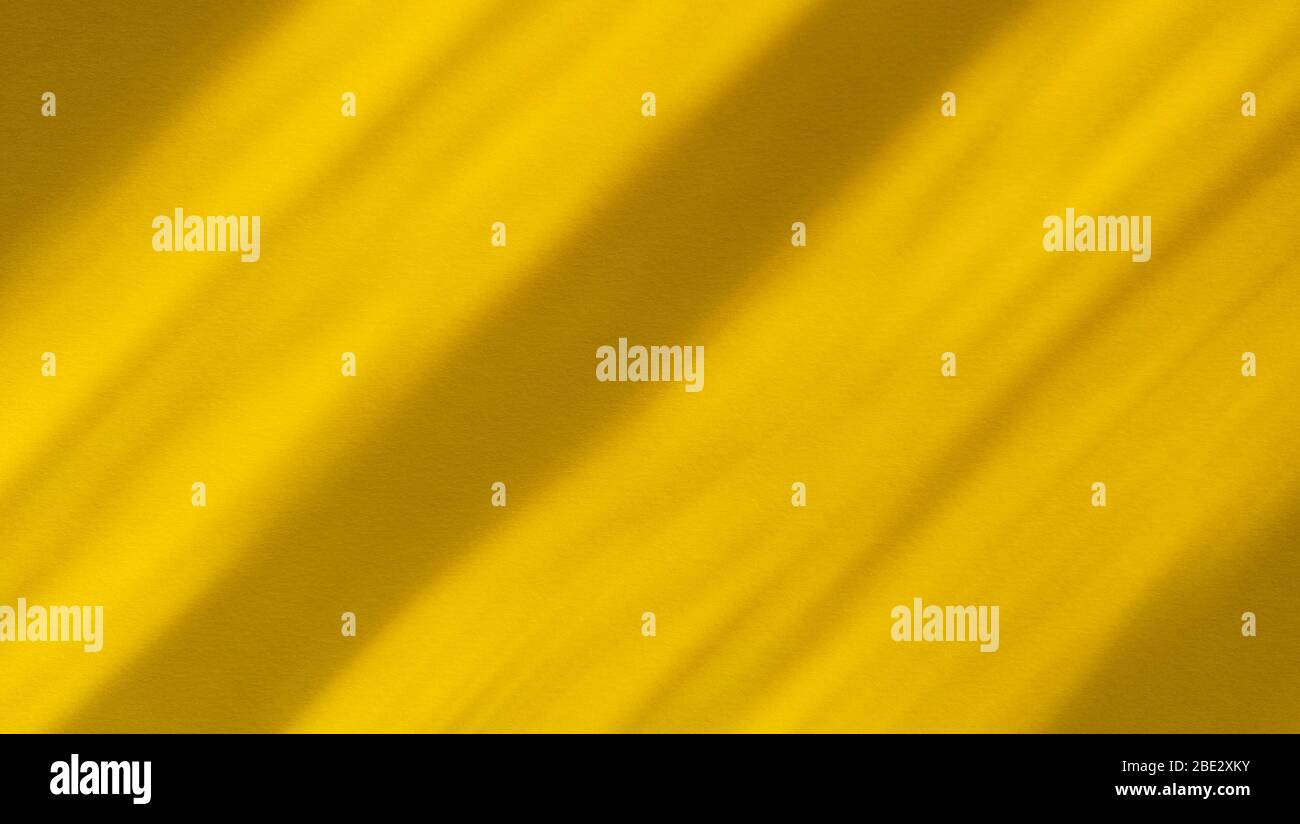 Ombres diagonales sur papier jaune pastel. Arrière-gorund abstrait. Photo. Banque D'Images