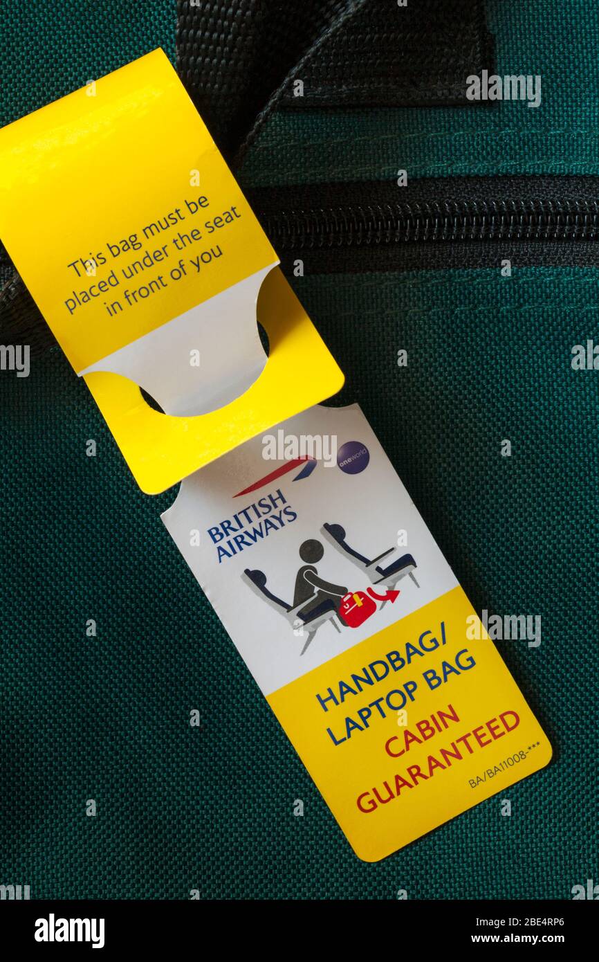 Ce sac doit être placé sous le siège devant vous - sac à main sac portable cabine garantie British Airways étiquette Banque D'Images