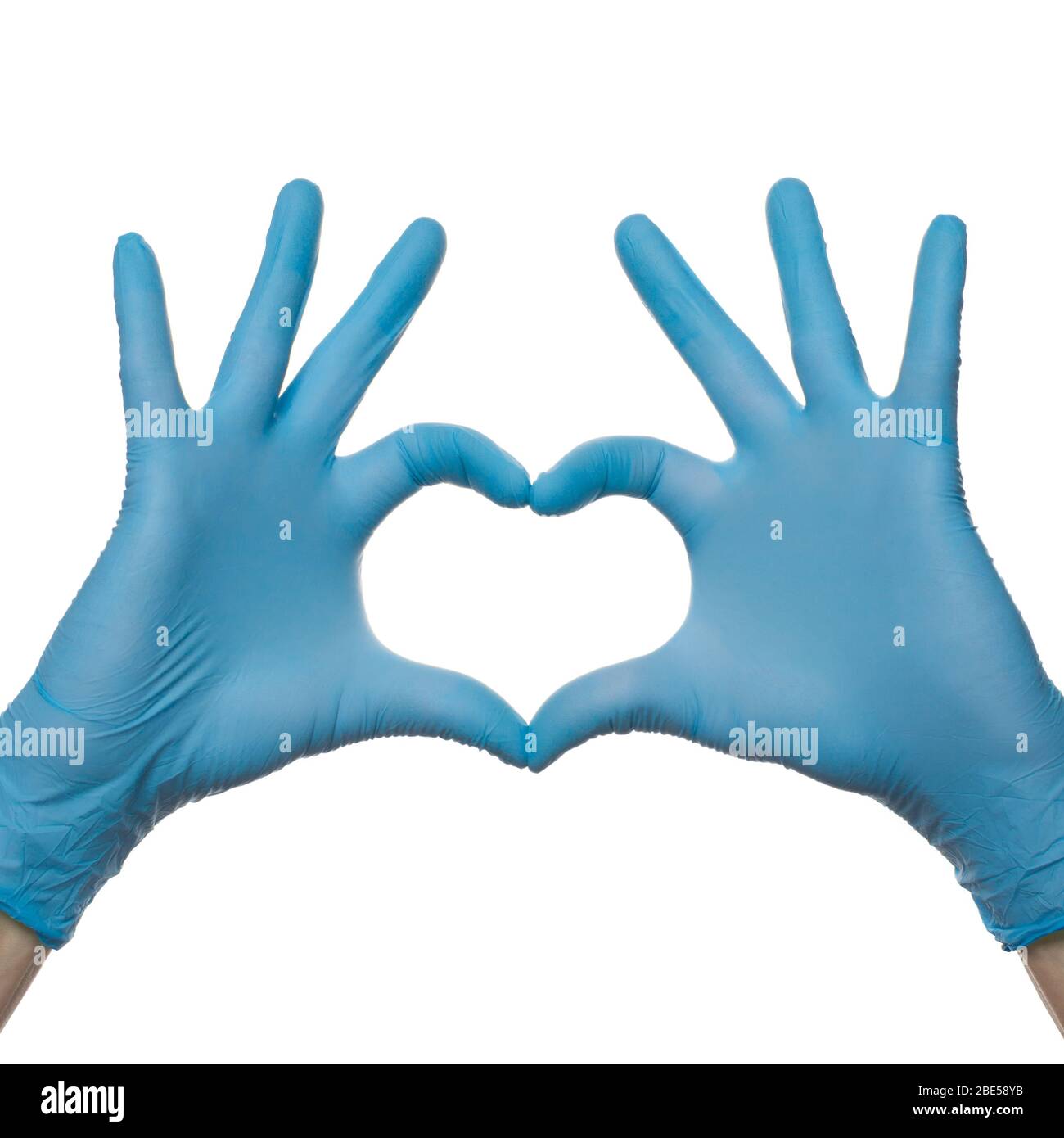 Gants médicaux. Le coeur des médecins mains dans des gants médicaux isolés  sur fond blanc Photo Stock - Alamy